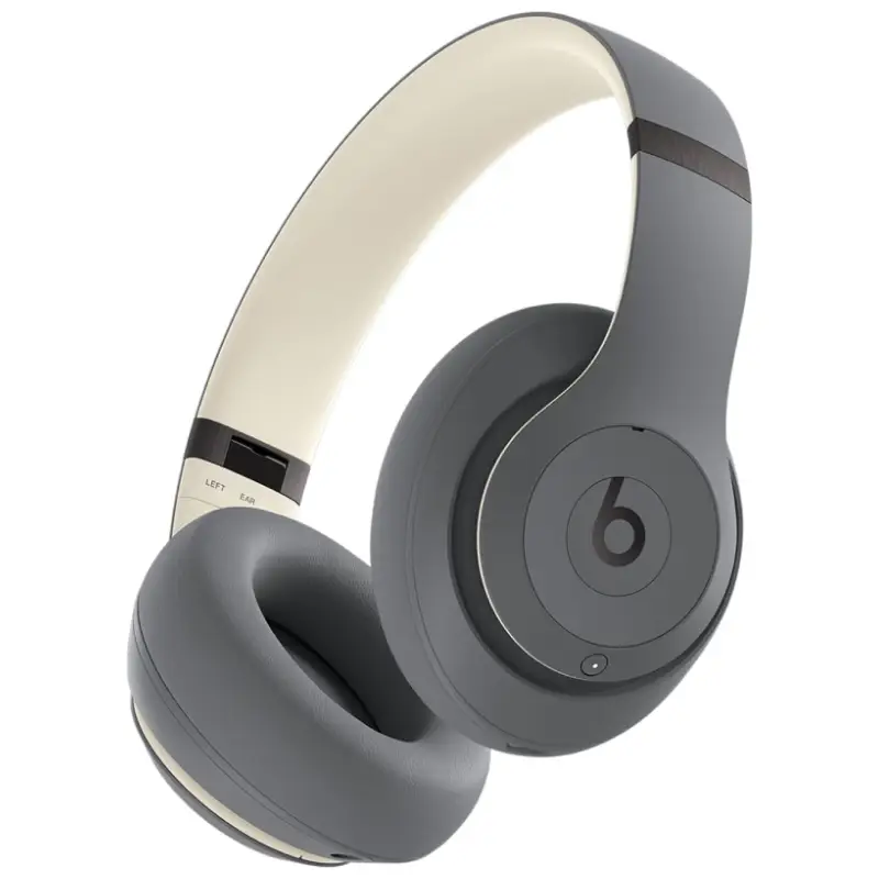 Sand gray Beats Studio Pro wireless headphones on a white background.